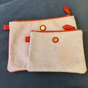 Pair of Paravel zip-top travel pouches, rare original orange color